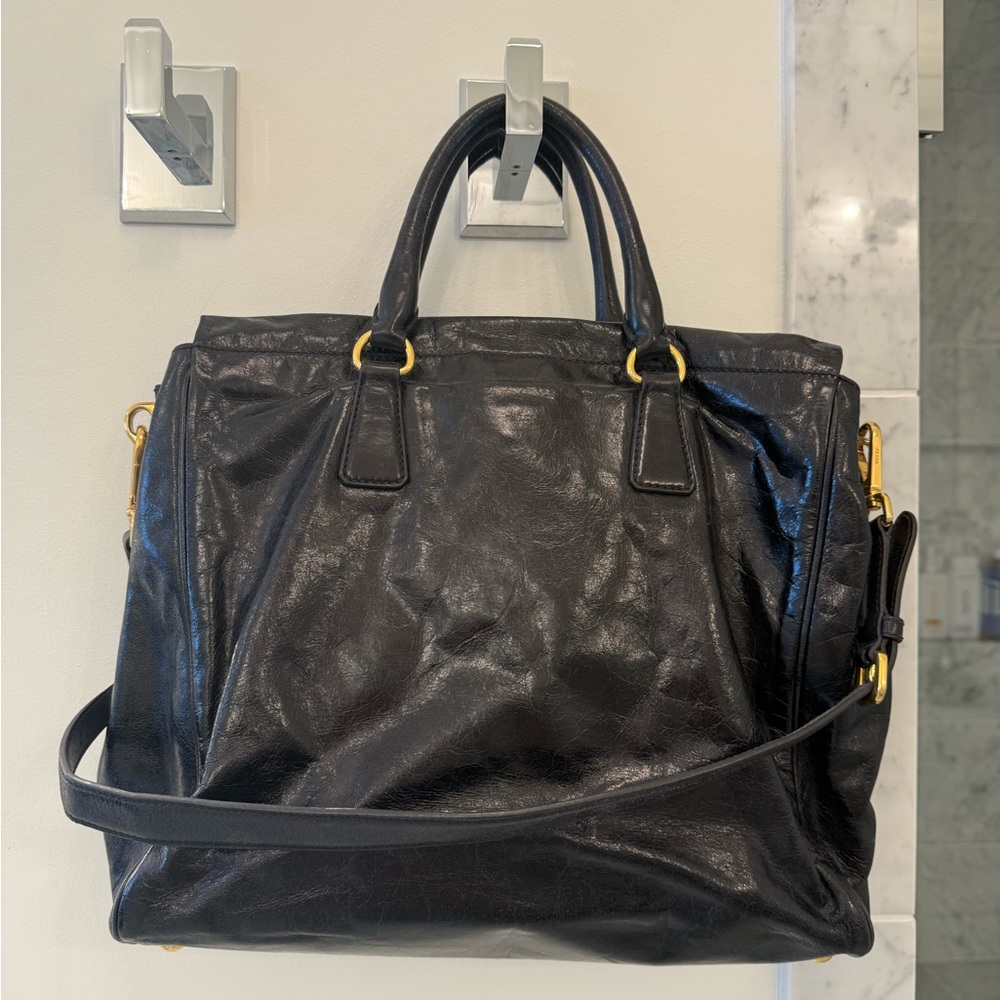 Prada Black Leather Handbag with Gold Accents - Picture 2 of 8